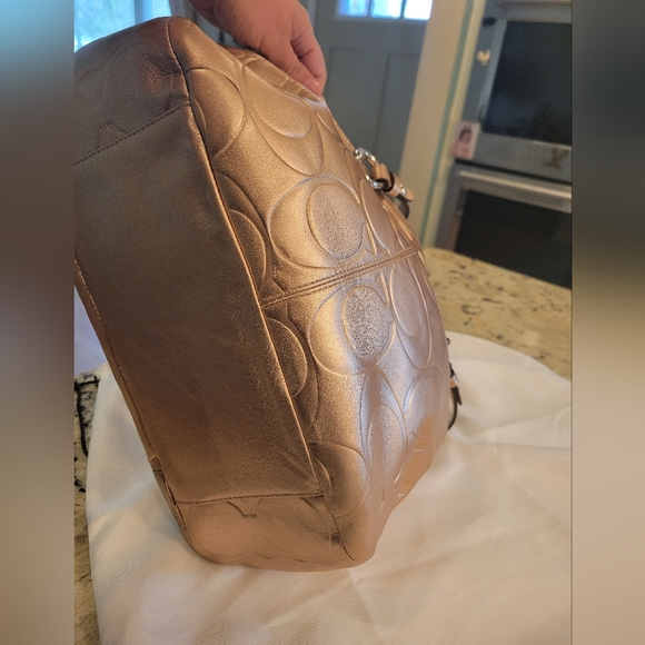 Coach gold purse good condition about 13 inches long and 7 inches tall - Picture 5 of 9